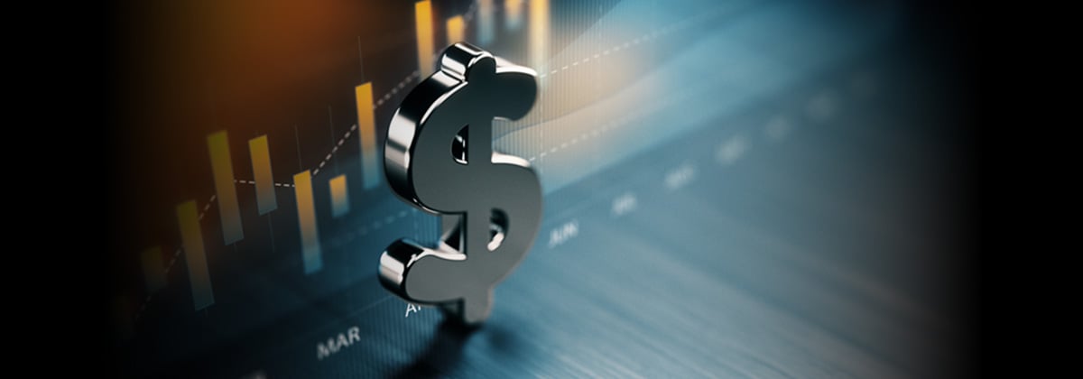 Shiny metal look dollar sign sitting in front of a 3D bar chart in blue and yellow