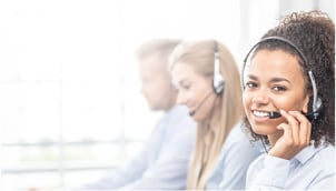 Smiling woman in a headset