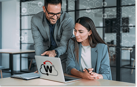 co-workers at a laptop